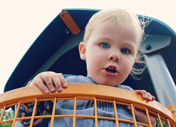 Baby on climbing frame
